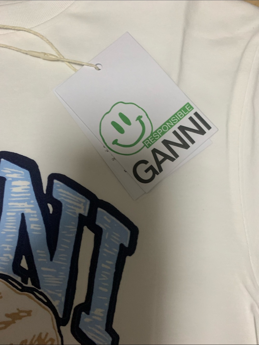 Ganni White Tee with Blue Logo and Tan Shell Graphic - Picture 4 of 5